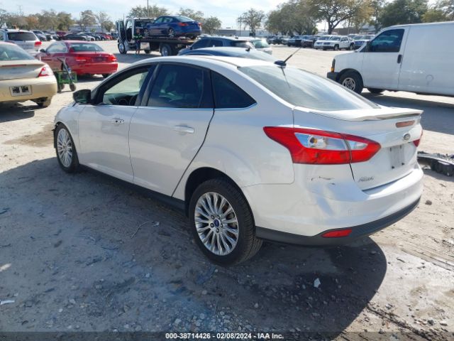 Photo 2 VIN: 1FAHP3J24CL251080 - FORD FOCUS 