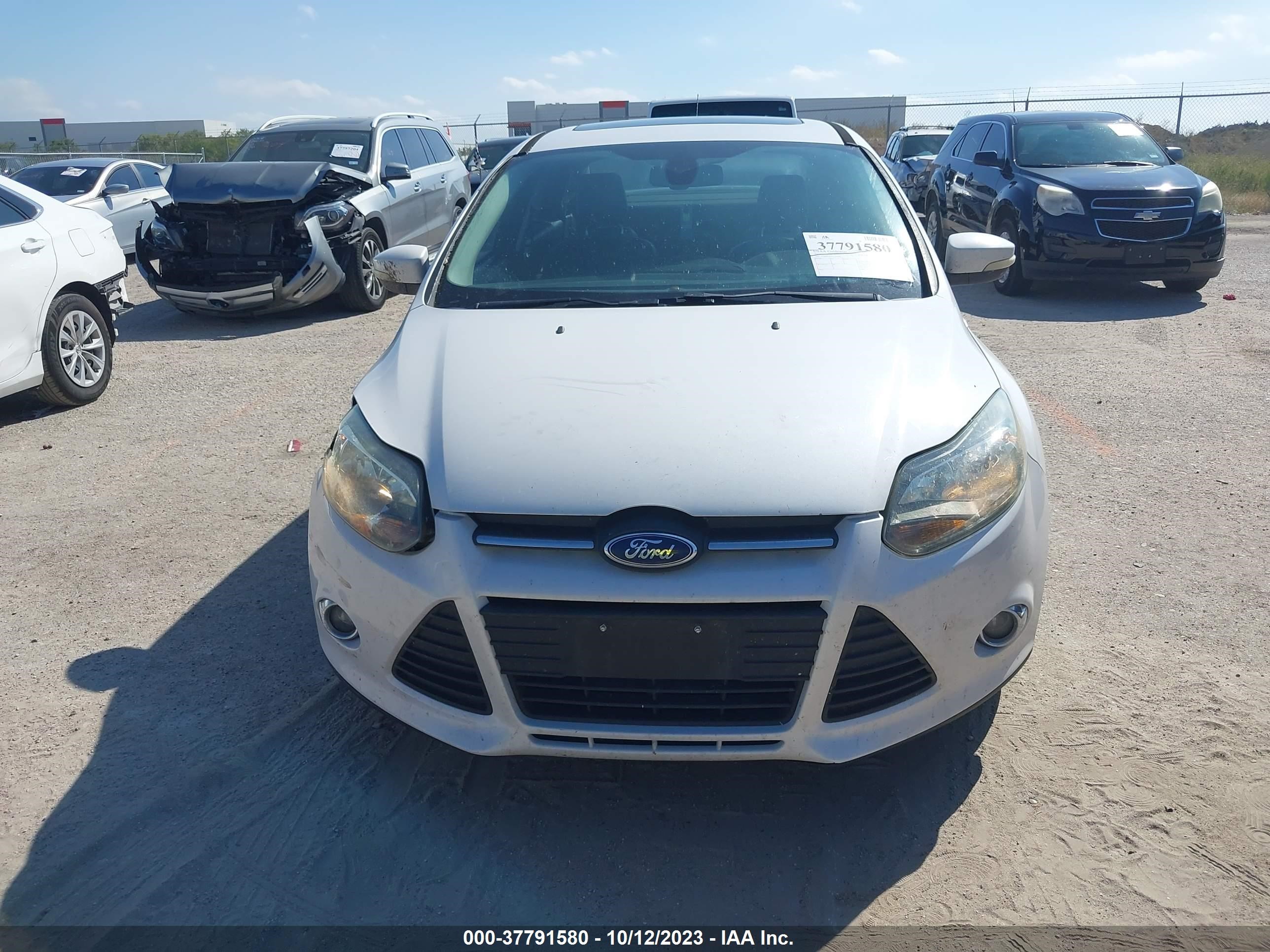 Photo 11 VIN: 1FAHP3J25CL195246 - FORD FOCUS 