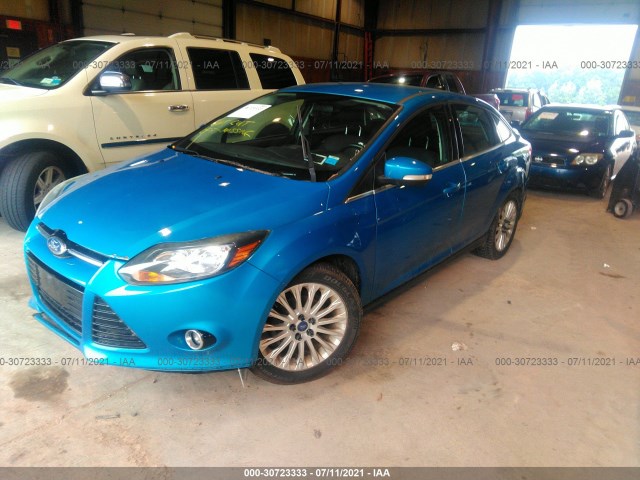 Photo 1 VIN: 1FAHP3J25CL209503 - FORD FOCUS 