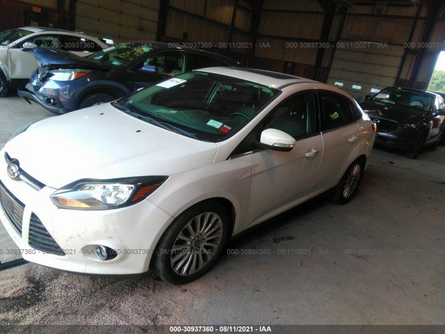 Photo 1 VIN: 1FAHP3J25CL335375 - FORD FOCUS 