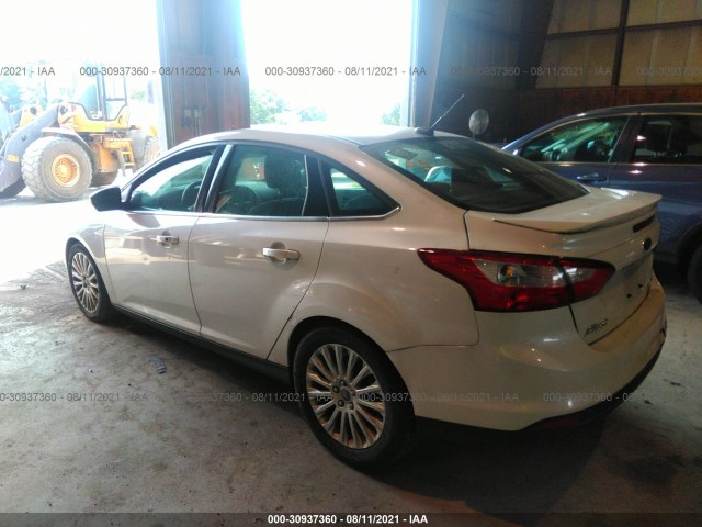 Photo 2 VIN: 1FAHP3J25CL335375 - FORD FOCUS 