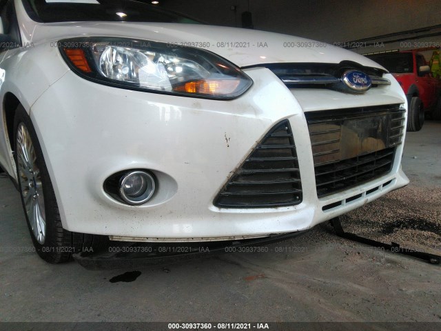 Photo 5 VIN: 1FAHP3J25CL335375 - FORD FOCUS 