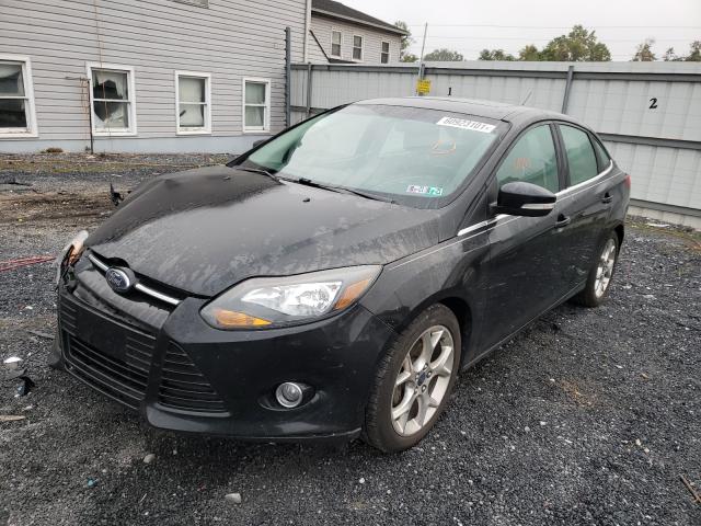 Photo 1 VIN: 1FAHP3J25CL381398 - FORD FOCUS TITA 