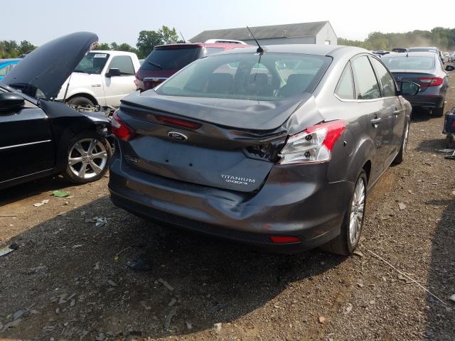 Photo 8 VIN: 1FAHP3J25CL446900 - FORD FOCUS 