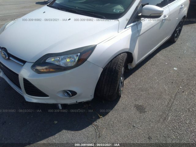 Photo 5 VIN: 1FAHP3J25CL450896 - FORD FOCUS 