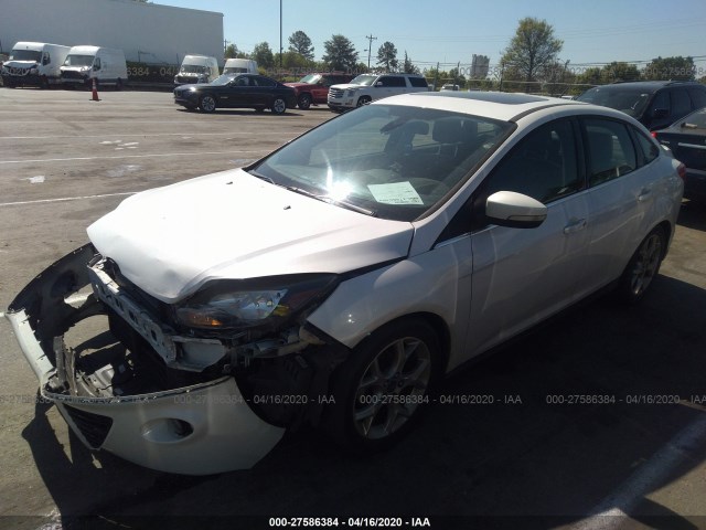 Photo 1 VIN: 1FAHP3J26CL287563 - FORD FOCUS 