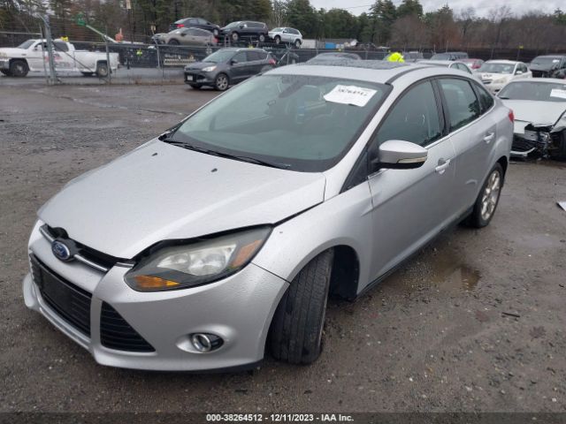 Photo 1 VIN: 1FAHP3J29CL229009 - FORD FOCUS 