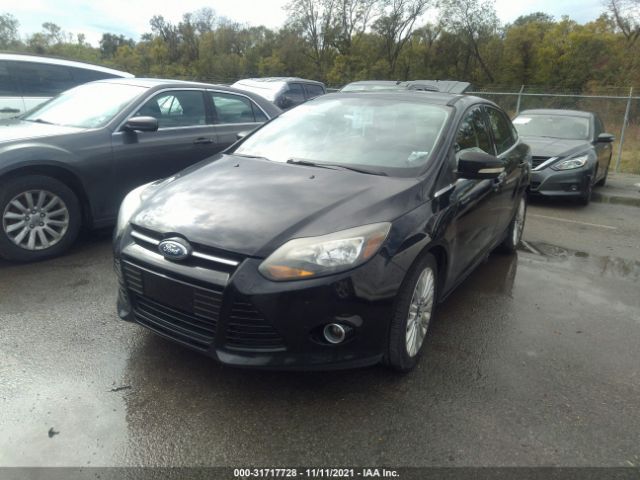 Photo 1 VIN: 1FAHP3J29CL308258 - FORD FOCUS 