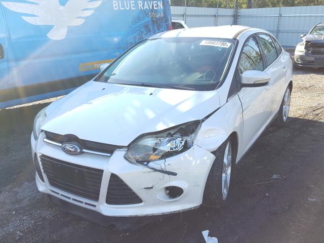 Photo 1 VIN: 1FAHP3J29CL377743 - FORD FOCUS TITA 