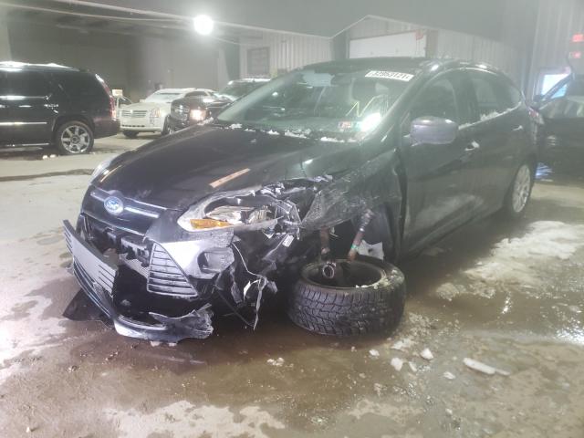 Photo 1 VIN: 1FAHP3K20CL132716 - FORD FOCUS SE 