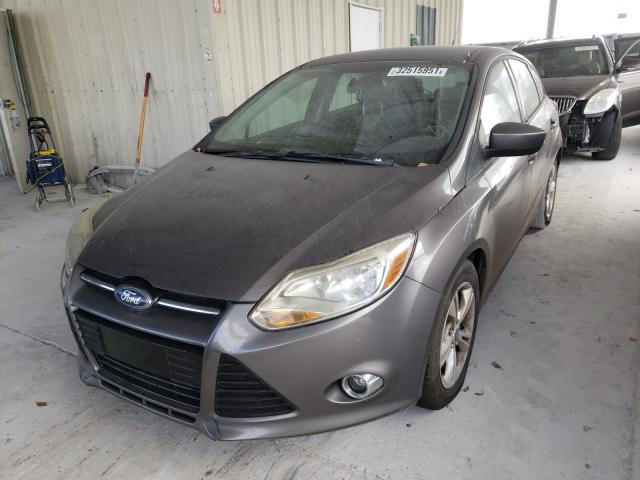 Photo 1 VIN: 1FAHP3K20CL242522 - FORD FOCUS SE 