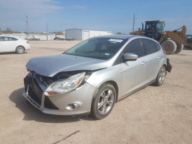 Photo 1 VIN: 1FAHP3K20CL243279 - FORD FOCUS SE 