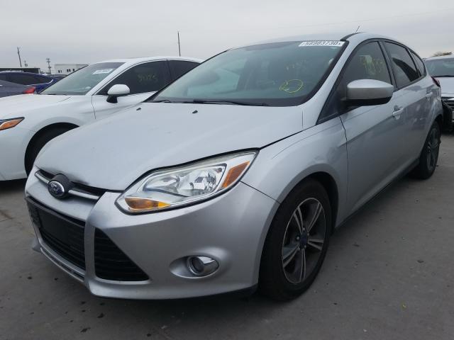 Photo 1 VIN: 1FAHP3K20CL327960 - FORD FOCUS SE 