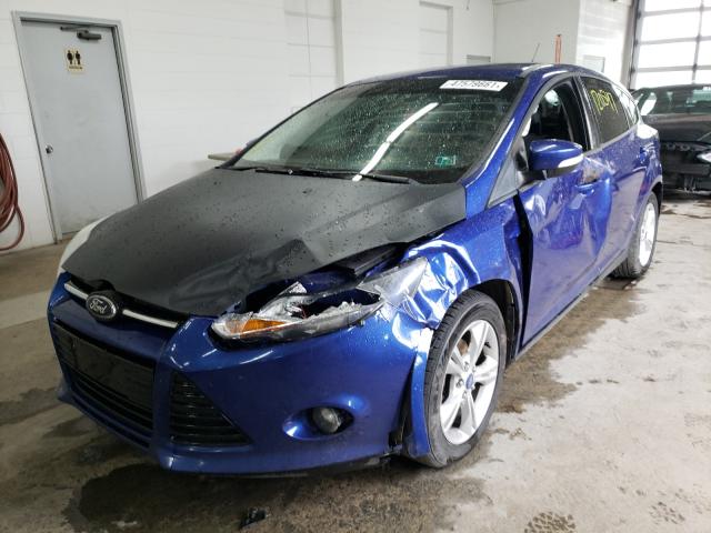 Photo 1 VIN: 1FAHP3K20CL365351 - FORD FOCUS SEL 