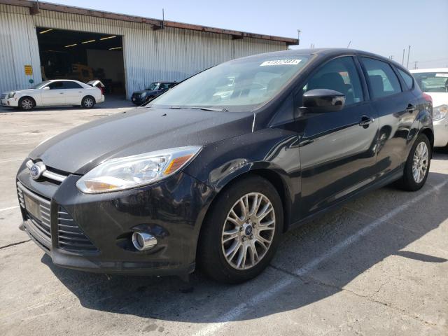 Photo 1 VIN: 1FAHP3K20CL411129 - FORD FOCUS SE 