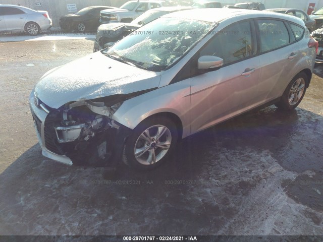 Photo 1 VIN: 1FAHP3K20CL477020 - FORD FOCUS 