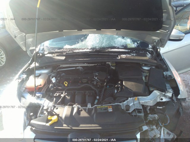 Photo 9 VIN: 1FAHP3K20CL477020 - FORD FOCUS 