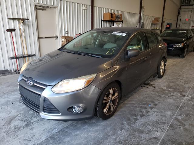 Photo 1 VIN: 1FAHP3K21CL136080 - FORD FOCUS SE 