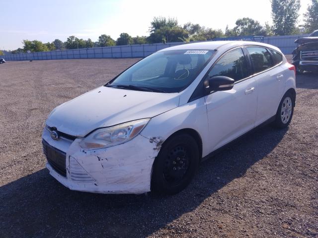 Photo 1 VIN: 1FAHP3K21CL170956 - FORD FOCUS SE 