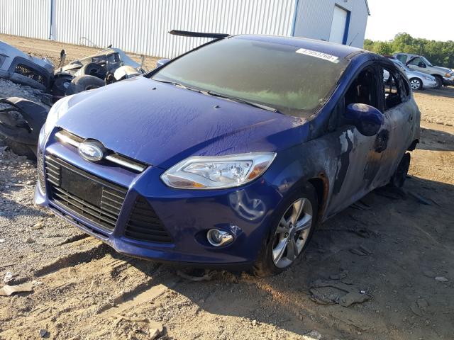 Photo 1 VIN: 1FAHP3K21CL248930 - FORD FOCUS SE 