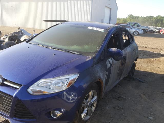 Photo 9 VIN: 1FAHP3K21CL248930 - FORD FOCUS SE 