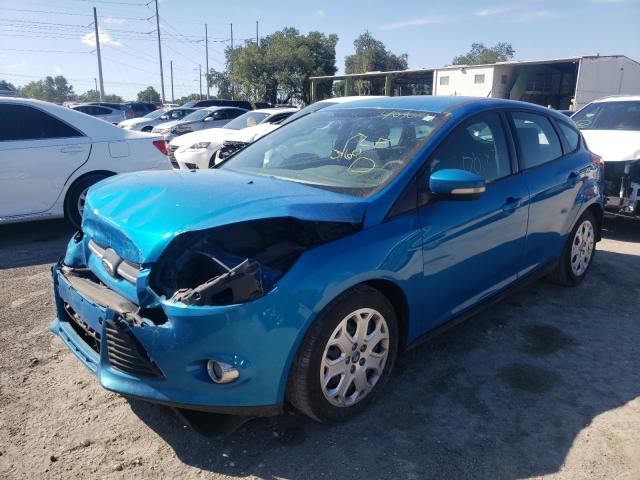 Photo 1 VIN: 1FAHP3K21CL300721 - FORD FOCUS SE 