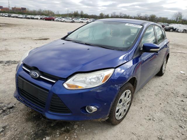 Photo 1 VIN: 1FAHP3K21CL310763 - FORD FOCUS SE 