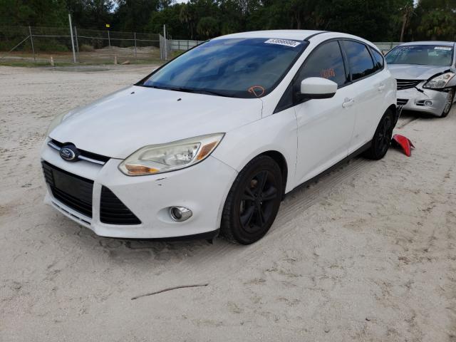 Photo 1 VIN: 1FAHP3K21CL408207 - FORD FOCUS SE 