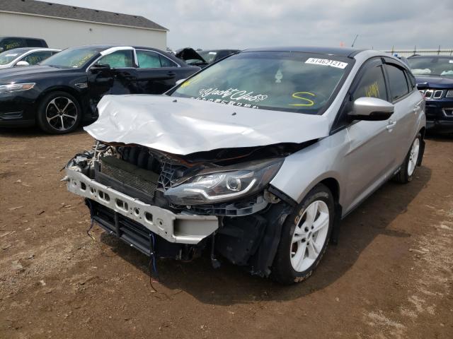 Photo 1 VIN: 1FAHP3K22CL234616 - FORD FOCUS SE 