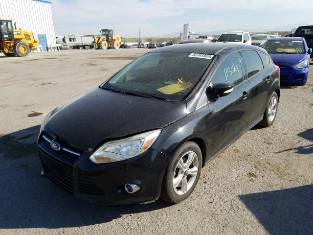 Photo 1 VIN: 1FAHP3K22CL392308 - FORD FOCUS SE 