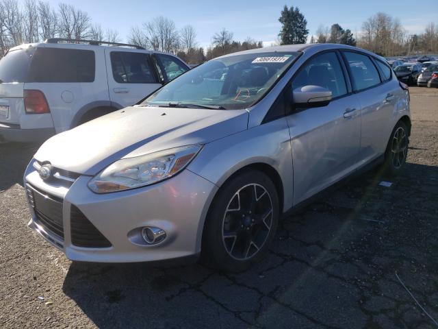 Photo 1 VIN: 1FAHP3K23CL119328 - FORD FOCUS SE 