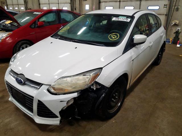 Photo 1 VIN: 1FAHP3K23CL210700 - FORD FOCUS SE 