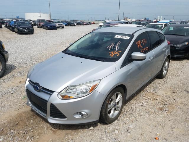 Photo 1 VIN: 1FAHP3K23CL250131 - FORD FOCUS SE 