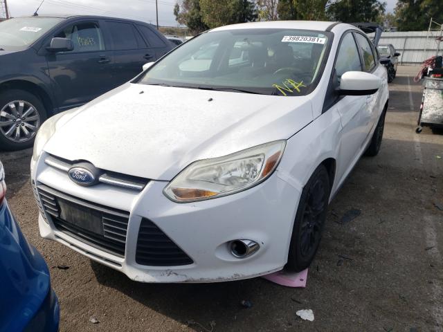 Photo 1 VIN: 1FAHP3K23CL303281 - FORD FOCUS SE 