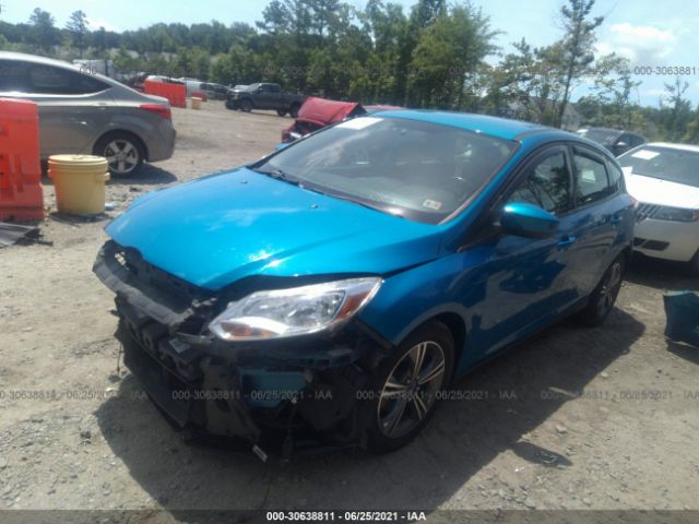 Photo 1 VIN: 1FAHP3K23CL311980 - FORD FOCUS 