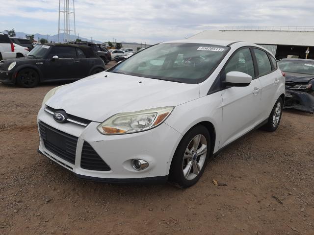 Photo 1 VIN: 1FAHP3K23CL338287 - FORD FOCUS SE 