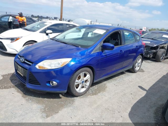 Photo 1 VIN: 1FAHP3K23CL400612 - FORD FOCUS 