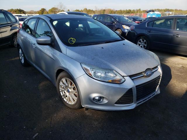 Photo 1 VIN: 1FAHP3K24CL112193 - FORD FOCUS SE 