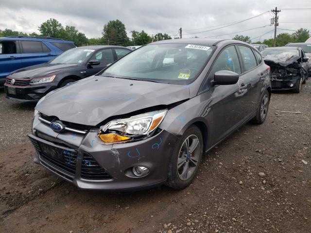 Photo 1 VIN: 1FAHP3K24CL229482 - FORD FOCUS SE 