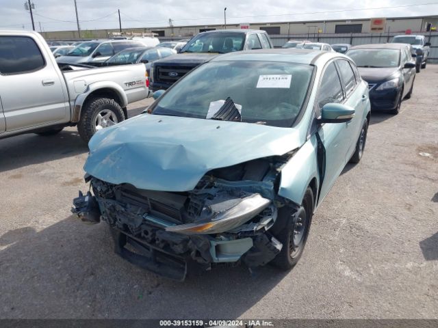 Photo 1 VIN: 1FAHP3K24CL249974 - FORD FOCUS 