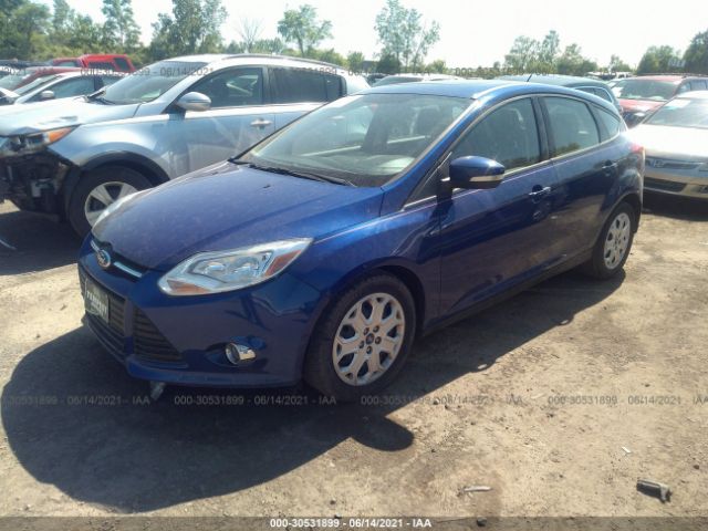 Photo 1 VIN: 1FAHP3K24CL319473 - FORD FOCUS 