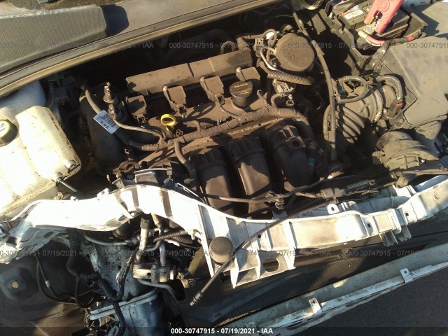 Photo 9 VIN: 1FAHP3K24CL445591 - FORD FOCUS 