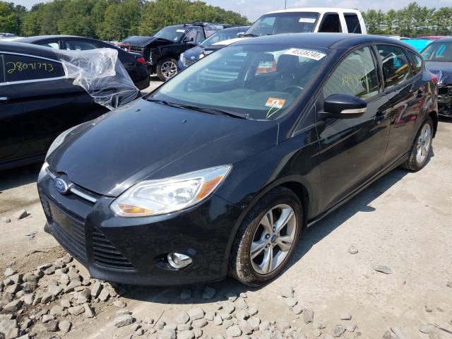 Photo 1 VIN: 1FAHP3K25CL124580 - FORD FOCUS SE 