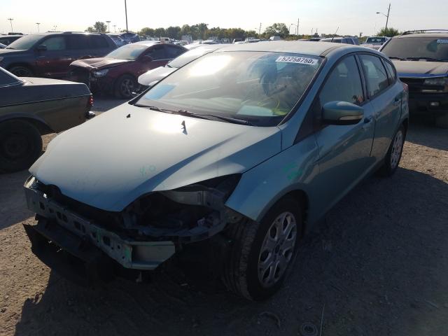 Photo 1 VIN: 1FAHP3K25CL229345 - FORD FOCUS SE 