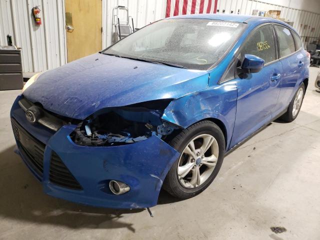 Photo 1 VIN: 1FAHP3K25CL235758 - FORD FOCUS SE 