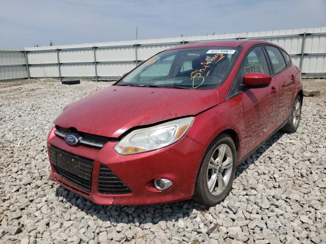 Photo 1 VIN: 1FAHP3K25CL300074 - FORD FOCUS SE 