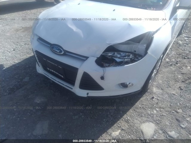 Photo 5 VIN: 1FAHP3K25CL306862 - FORD FOCUS 