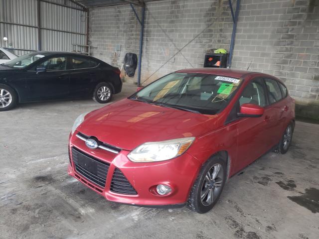 Photo 1 VIN: 1FAHP3K25CL319465 - FORD FOCUS SE 