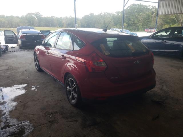 Photo 2 VIN: 1FAHP3K25CL319465 - FORD FOCUS SE 