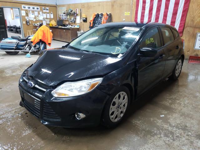 Photo 1 VIN: 1FAHP3K25CL353566 - FORD FOCUS SE 